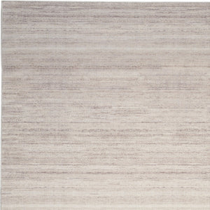 Homeroots 9' Ivory And Light Brown Abstract Washable Area Rug – Modern Artistry For Your Home Décor Needs 9' X 12' Polyester Blend 552526