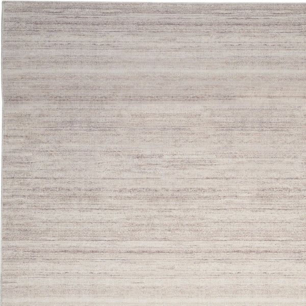 Homeroots 9' Ivory And Light Brown Abstract Washable Area Rug – Modern Artistry For Your Home Décor Needs 9' X 12' Polyester Blend 552526