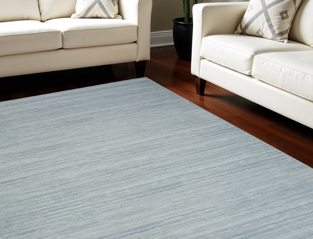 HomeRoots 9' Aqua Abstract Washable Area Rug – Modern Design for Stylish Living Spaces, Easy Care and Versatile Use 6' X 9' 552549