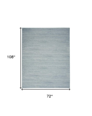 Homeroots 9' Aqua Abstract Washable Area Rug - Modern Comfort For Your Home, Stylish, Noise-reducing Design 6' X 9' Polyester Blend 552549