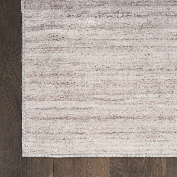 HomeRoots 9' Abstract Washable Area Rug in Ivory and Light Brown - Modern Elegance for Any Space 6' X 9' 552551
