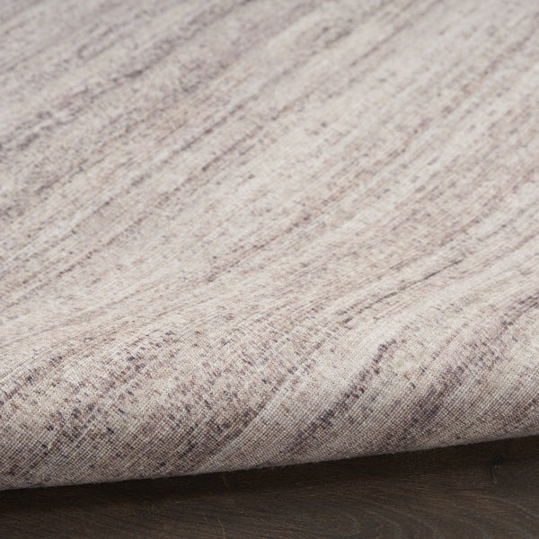 HomeRoots 9' Abstract Washable Area Rug in Ivory and Light Brown - Modern Elegance for Any Space 6' X 9' 552551