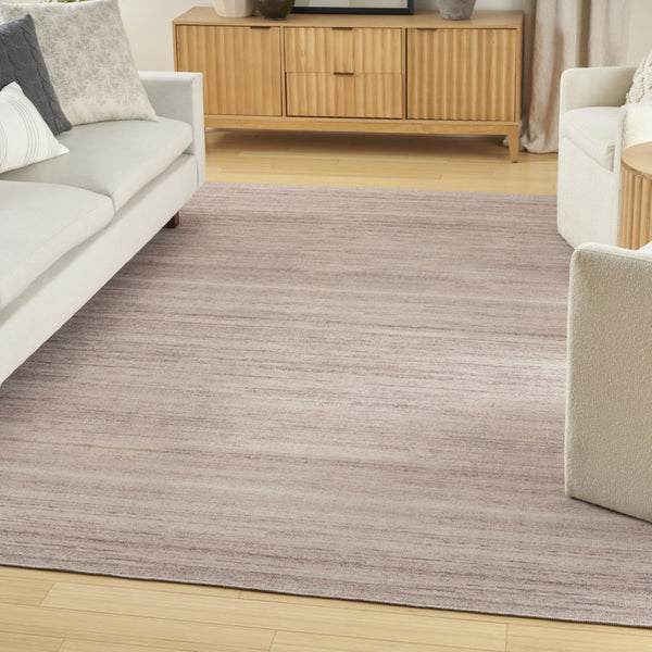 HomeRoots 9' Abstract Washable Area Rug in Ivory and Light Brown - Modern Elegance for Any Space 6' X 9' 552551