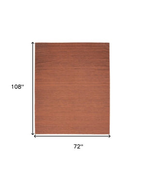 Homeroots 9' Brick Red Abstract Washable Area Rug – Stylish, Modern Design To Enhance Any Room's Warmth! 6' X 9' Polyester Blend 552556