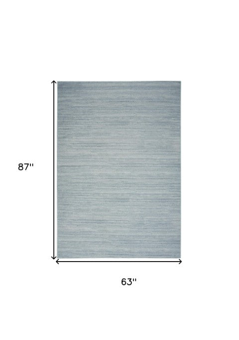 Homeroots 9' Aqua Abstract Washable Area Rug - Modern Comfort For Your Home, Stylish, Noise-reducing Design 5' X 7' Polyester Blend 552559