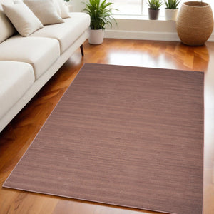 Homeroots 9' Modern Brown Abstract Washable Area Rug – Stylish, Cozy Addition For Any Home Interior Decor 5' X 7' Polyester Blend 552560