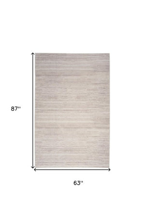 Homeroots 9' Ivory And Light Brown Abstract Washable Area Rug – Modern Artistry For Your Home Décor Needs 5' X 7' Polyester Blend 552561