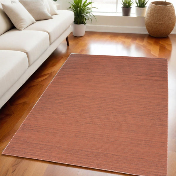 Homeroots 9' Brick Red Abstract Washable Area Rug – Stylish, Modern Design To Enhance Any Room's Warmth! 5' X 7' Polyester Blend 552566