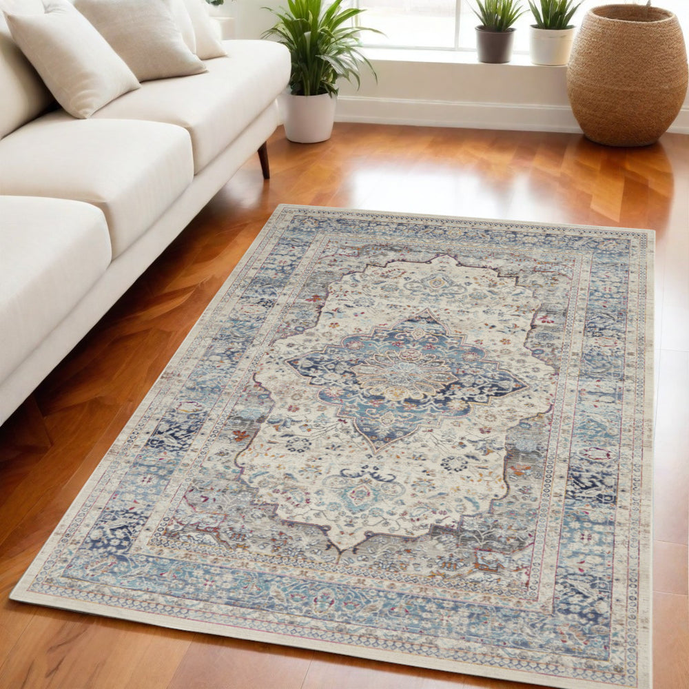 Homeroots 5' X 8' Ivory Blue And Orange Floral Distressed Area Rug - Durable, Stain Resistant, Stylish Accent Piece  Polypropylene 552684