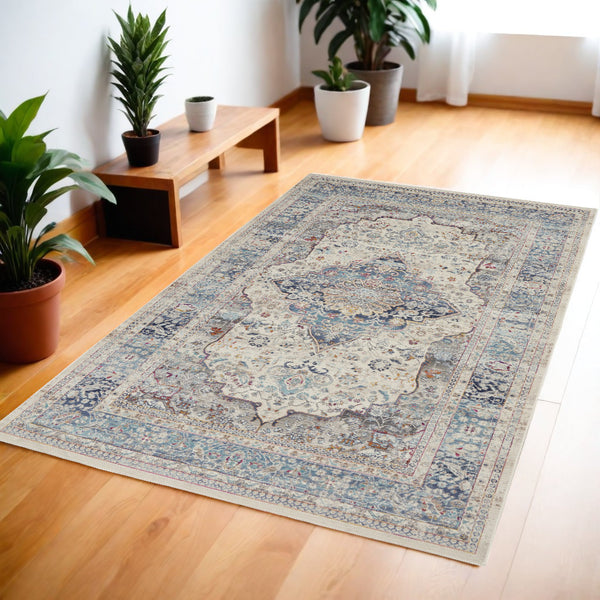 Homeroots 4' X 6' Ivory Blue And Orange Floral Distressed Area Rug – Durable, Stain-resistant, Stylish Design!  Polypropylene 552688