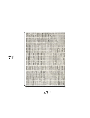 Homeroots 4' X 6' Ivory And Black Geometric Area Rug  Polyester 552727