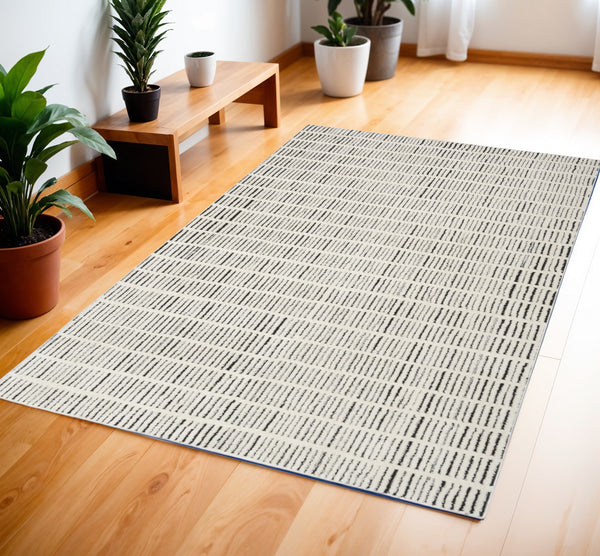 Homeroots 4' X 6' Ivory And Black Geometric Area Rug  Polyester 552727