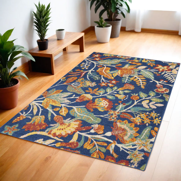 Homeroots 4' X 6' Blue And Orange Floral Power Loom Area Rug - Vibrant Design For Stylish Home Decor Enhancement 4' X 6' Polypropylene 552751