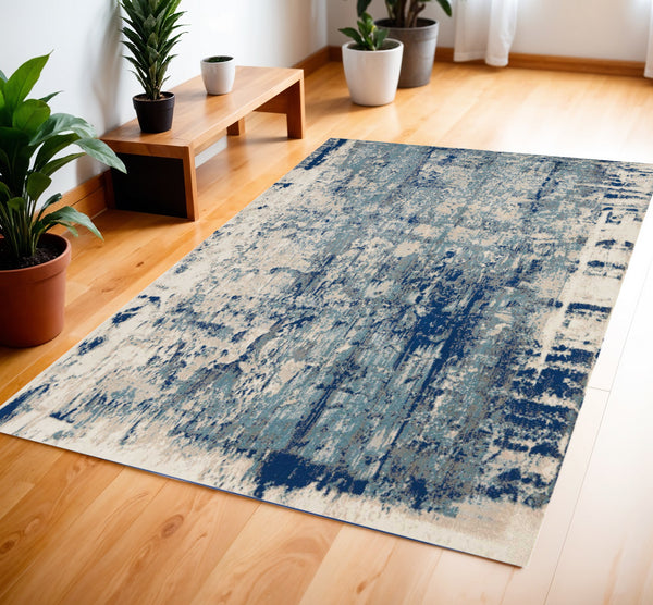Homeroots 4' X 6' Ivory Blue And Slate Gray Abstract Area Rug  Polyester 552782