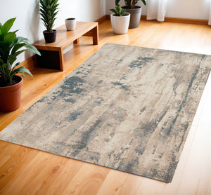 Homeroots 4' X 6' Ivory And Teal Blue Abstract Area Rug  Polyester 552783