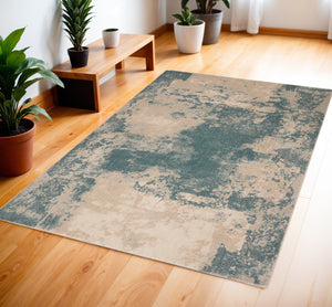 Homeroots 4' X 6' Ivory And Teal Blue Abstract Area Rug  Polyester 552784