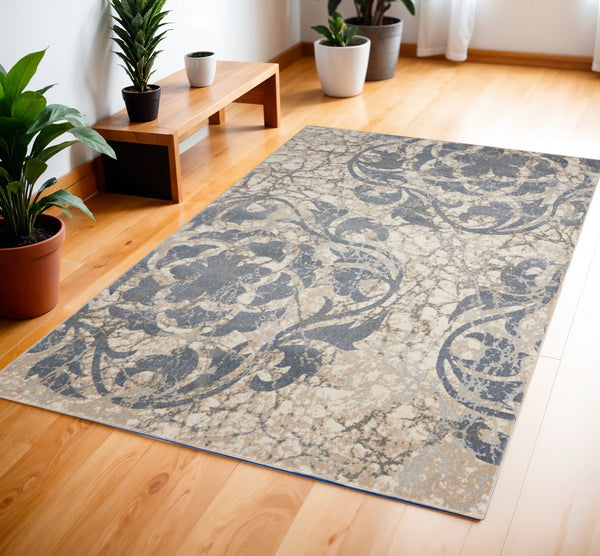 Homeroots 4' X 6' Ivory Tan And Slate Gray Floral Distressed Area Rug  Polyester 552785