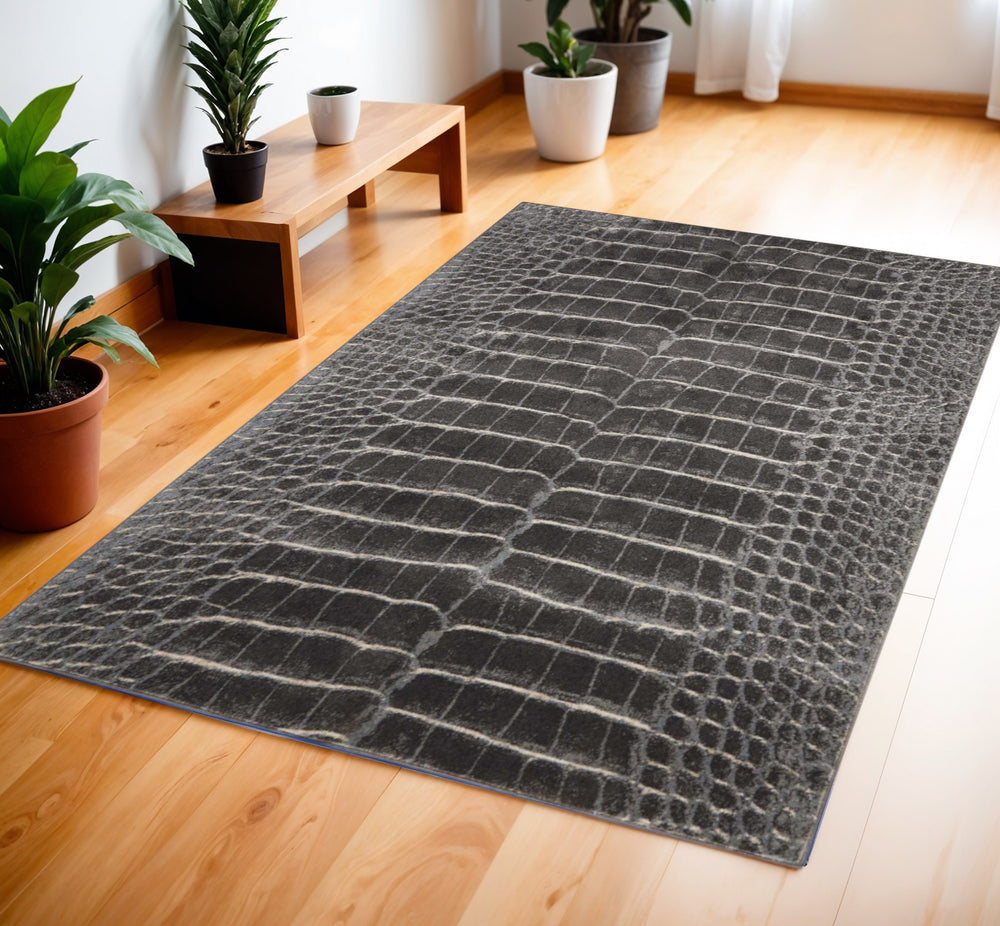 Homeroots 4' X 6' Beige Charcoal And Cream Animal Print Distressed Area Rug  Polyester 552794