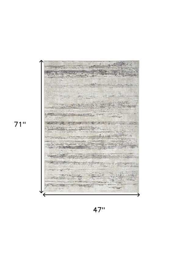 Homeroots 4' X 6' Cream And Gray Abstract Non Skid Area Rug  Polyester 552814
