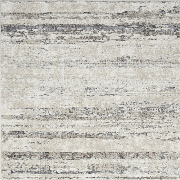 Homeroots 4' X 6' Cream And Gray Abstract Non Skid Area Rug  Polyester 552814