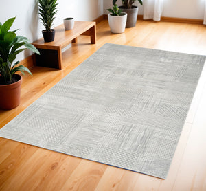 Homeroots 4' X 6' Ivory Silver And Gray Abstract Non Skid Area Rug  Polyester 552816