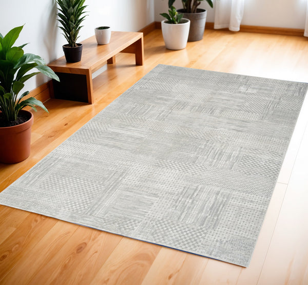 Homeroots 4' X 6' Ivory Silver And Gray Abstract Non Skid Area Rug  Polyester 552816