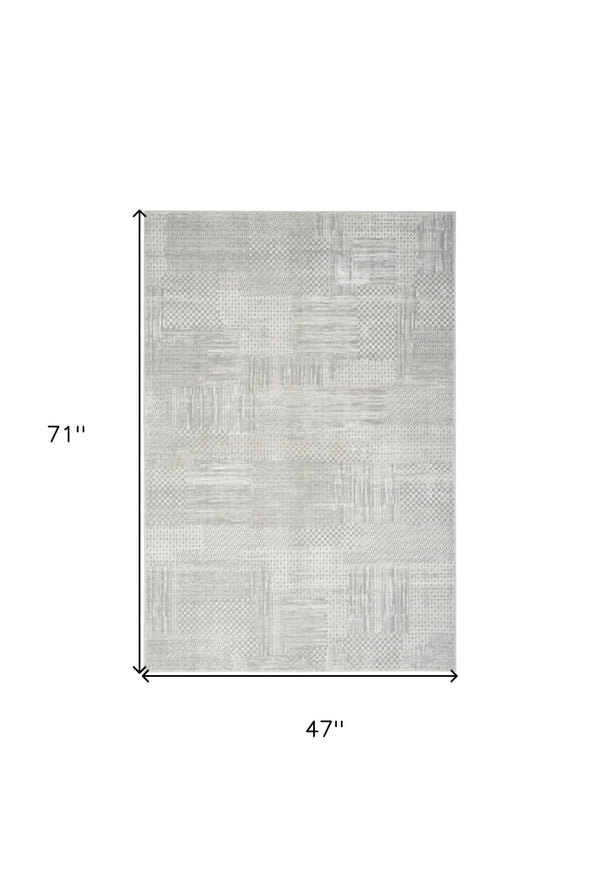 Homeroots 4' X 6' Ivory Silver And Gray Abstract Non Skid Area Rug  Polyester 552816