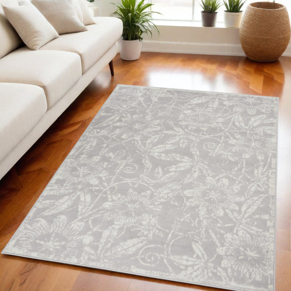 Homeroots 7' Ivory And Gray Floral Distressed Non-skid Area Rug - Perfect For Pets, Stain-resistant & Durable 5' X 7' Polyester 553044