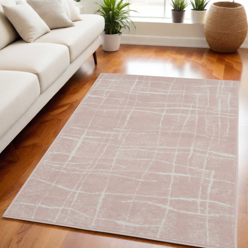 Homeroots 5' X 7' Pink And Ivory Abstract Geometric Area Rug  Polypropylene 553056