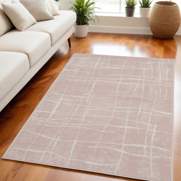 Homeroots 5' X 7' Pink And Ivory Abstract Geometric Area Rug  Polypropylene 553056