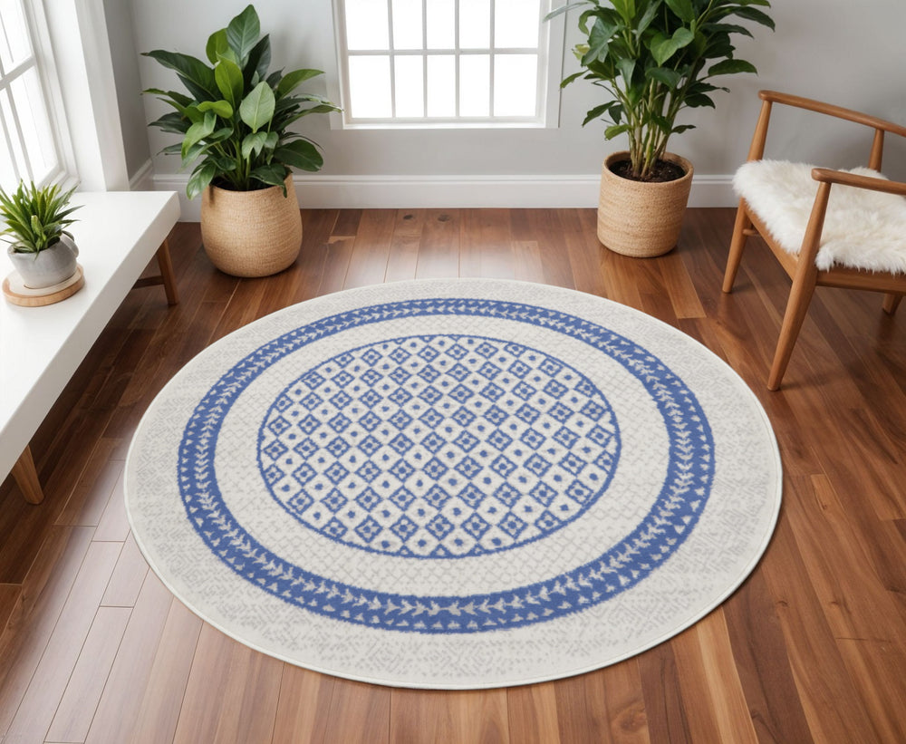 Homeroots 8' Ivory And Blue Geometric Round Rug - Durable, Stain Resistant, Perfect For Homes With Kids & Pets  Polyester 553085