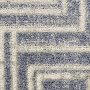 HomeRoots 9' Blue Geometric Distressed Area Rug - Stylish Vintage-Inspired Design for Modern & Traditional Spaces 9' X 12' 553138