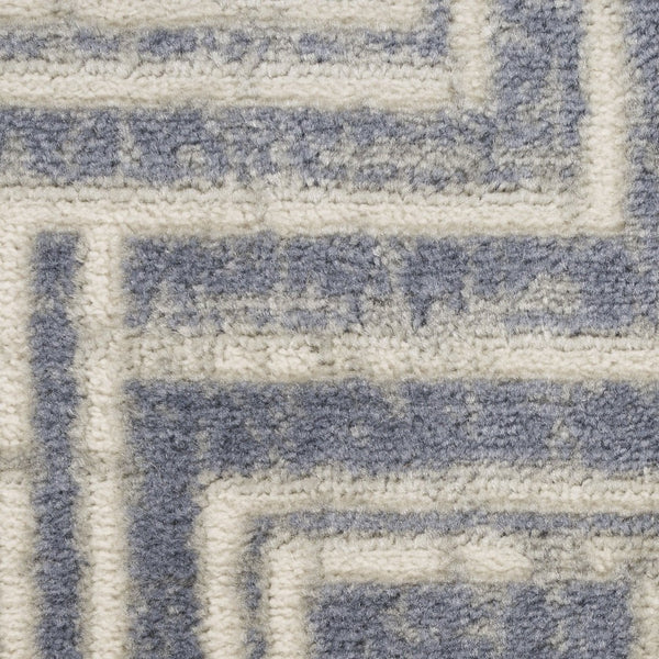 HomeRoots 9' Blue Geometric Distressed Area Rug - Stylish Vintage-Inspired Design for Modern & Traditional Spaces 9' X 12' 553138