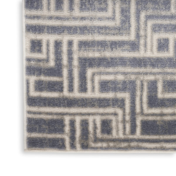 HomeRoots 9' Blue Geometric Distressed Area Rug - Stylish Vintage-Inspired Design for Modern & Traditional Spaces 9' X 12' 553138