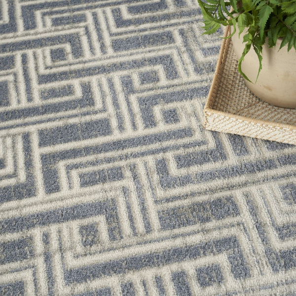 HomeRoots 9' Blue Geometric Distressed Area Rug - Stylish Vintage-Inspired Design for Modern & Traditional Spaces 9' X 12' 553138