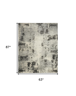 Homeroots 5' X 7' Cream Abstract Area Rug  Synthetic 553168