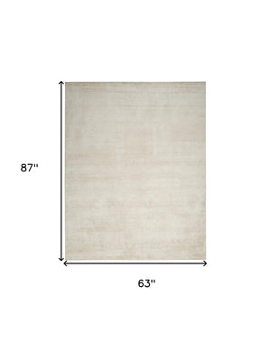 Homeroots 5' X 7' Cream Abstract Area Rug  Synthetic 553169