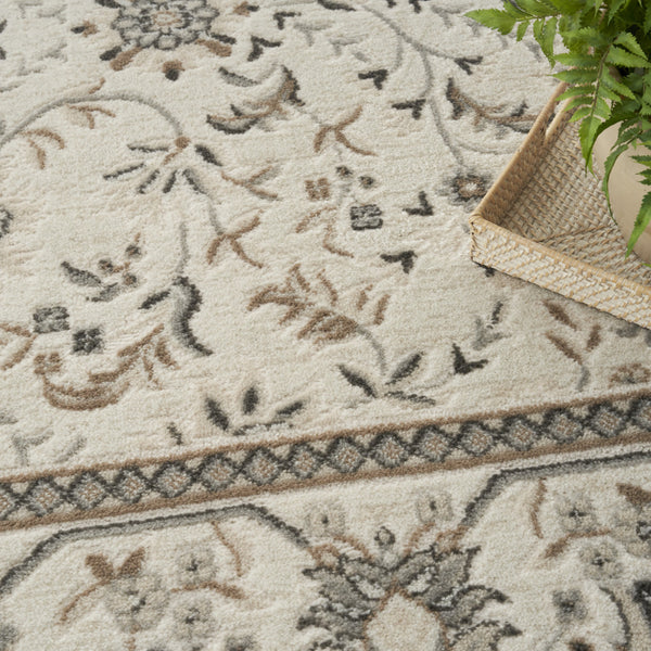 Homeroots 9' X 12' Cream Floral Distressed Area Rug  Synthetic 553192