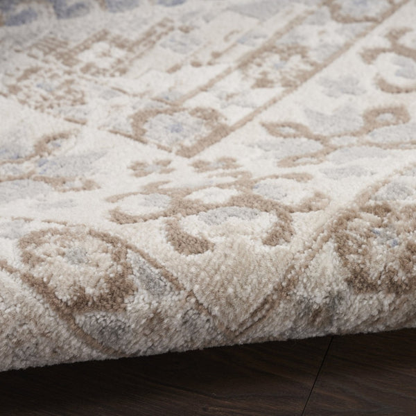 HomeRoots 9' Blue Geometric Distressed Area Rug – Timeless Elegance for Living Spaces with Soft Warmth & Style 8' X 10' 553204