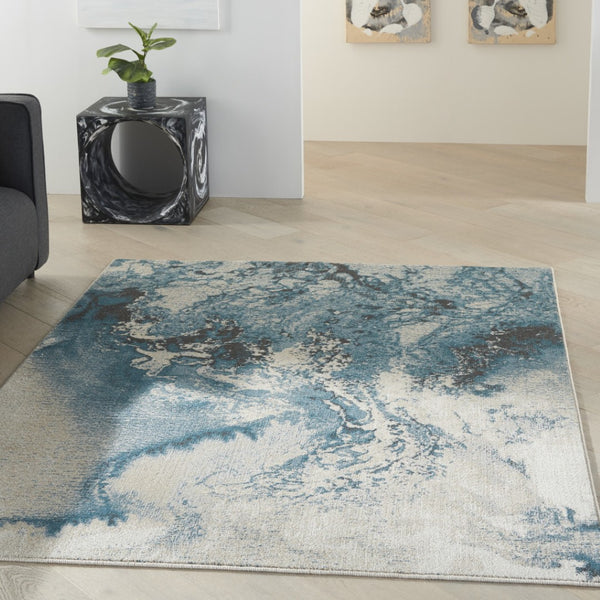 HomeRoots 5' Modern Teal and Ivory Abstract Area Rug - Stylish, Non-Skid, Stain-Resistant for High-Traffic Spaces 4' X 6' 553216