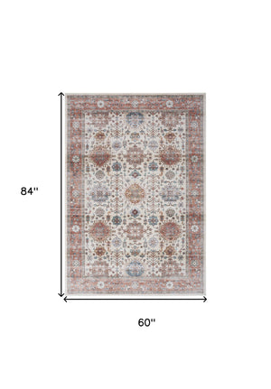 Homeroots 5' X 7' Beige And Orange Oriental Distressed Non Skid Area Rug  Polyester 553233