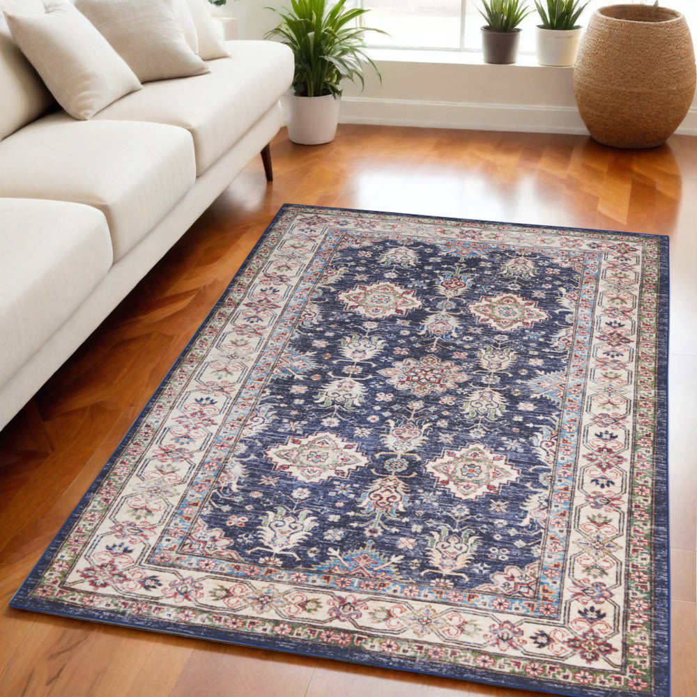 Homeroots 5' X 7' Blue And Ivory Oriental Distressed Non Skid Area Rug  Polyester 553234
