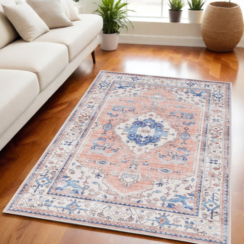 Homeroots 5' X 7' Ivory Blue And Coral Oriental Distressed Non Skid Area Rug  Polyester 553239
