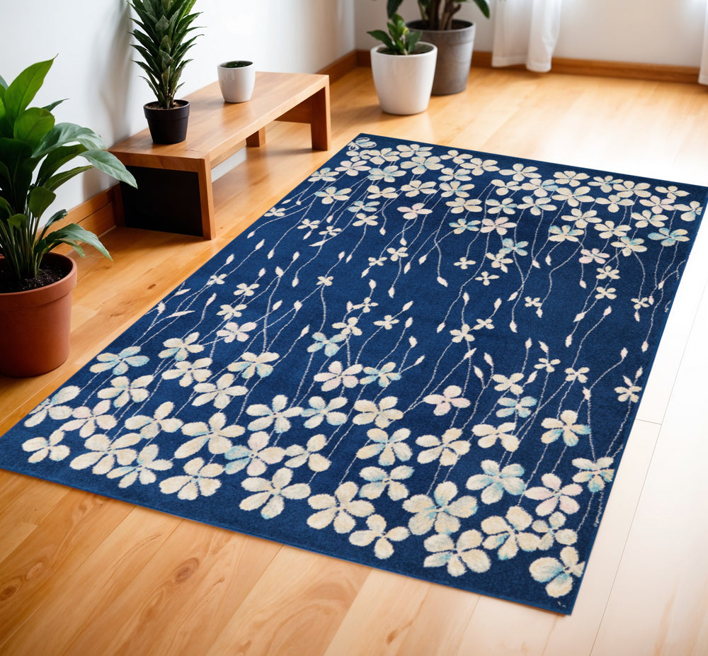 Homeroots 4' Navy Blue And Ivory Floral Area Rug – Durable, Stain Resistant, Perfect For Kids And Pets!  Polypropylene 553258