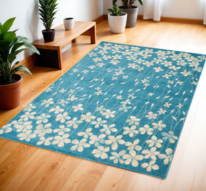 Homeroots 8' Turquoise And Cream Floral Area Rug - Durable, Stain-resistant Design For Stylish Comfort And Appeal 4' X 6' Polypropylene 553259