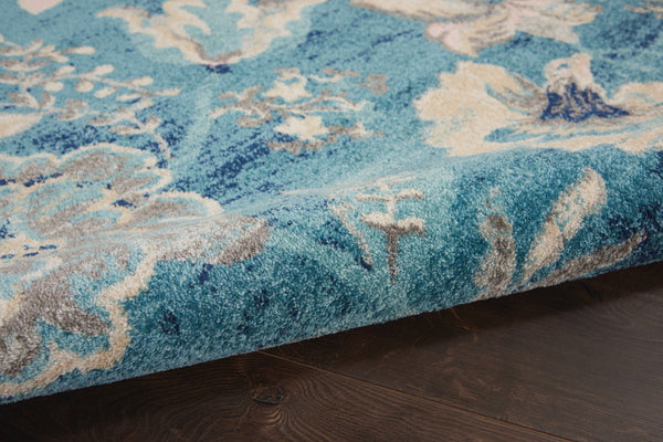 Homeroots 6' Stunning Turquoise Cream & Navy Floral Distressed Area Rug - Durable, Stain Resistant Design! 4' X 6' Polypropylene 553260