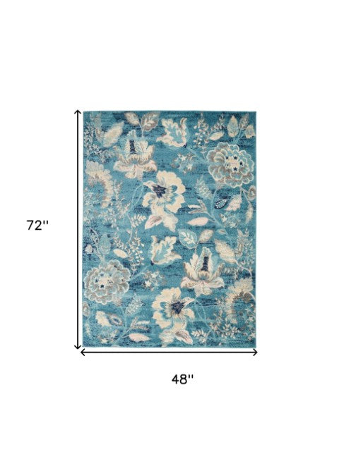 Homeroots 6' Stunning Turquoise Cream & Navy Floral Distressed Area Rug - Durable, Stain Resistant Design! 4' X 6' Polypropylene 553260