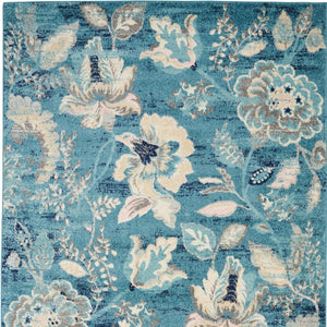 Homeroots 6' Stunning Turquoise Cream & Navy Floral Distressed Area Rug - Durable, Stain Resistant Design! 4' X 6' Polypropylene 553260