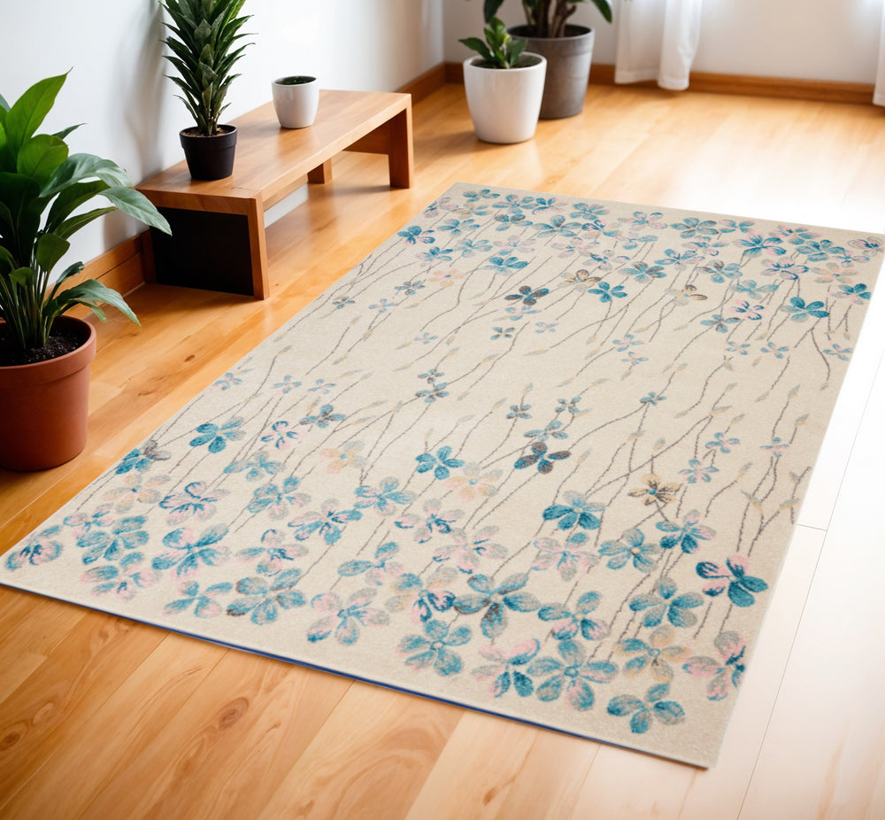 Homeroots 4' X 6' Ivory And Blue Floral Area Rug - Durable, Stain Resistant, Perfect For Homes With Kids & Pets!  Polypropylene 553271