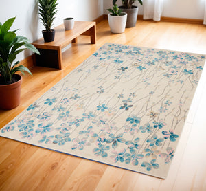 Homeroots 4' X 6' Ivory And Blue Floral Area Rug - Durable, Stain Resistant, Perfect For Homes With Kids & Pets!  Polypropylene 553271